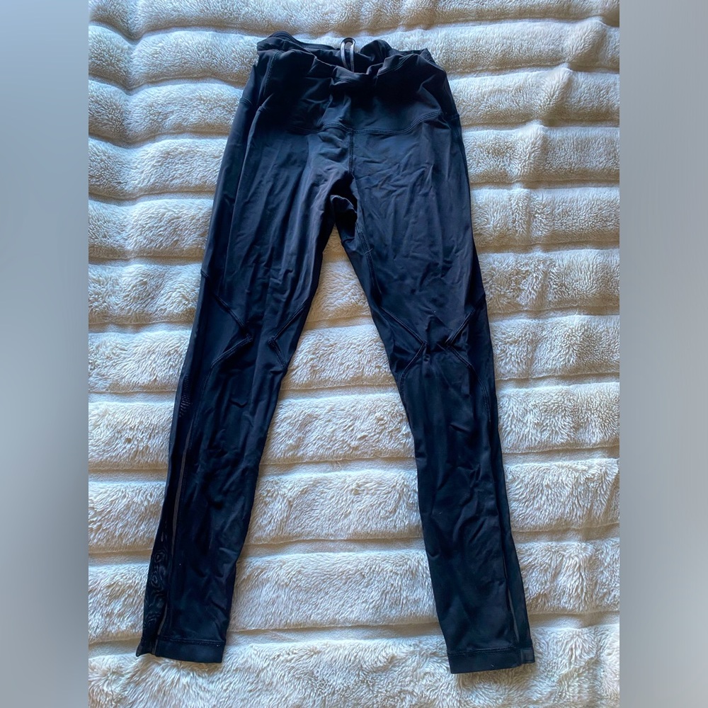 Lululemon black leggings with mesh details, Size 6